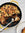 Chestnut & Lentil Ragù Bake with Potato Gratin and Fried Sage